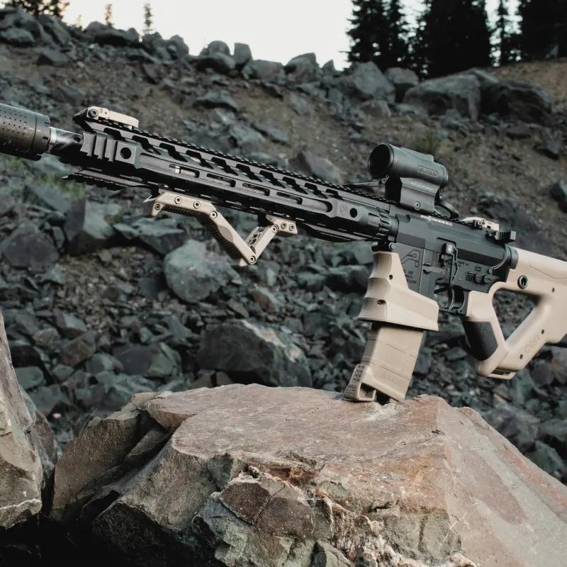 AR-15 rifle equipped with Hera Arms HFGA Adjustable Fore Grip and CQR Gen 1.0 Buttstock, both in Flat Dark Earth, for improved control and stability.